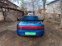 Сүрөт унаа Mazda 323