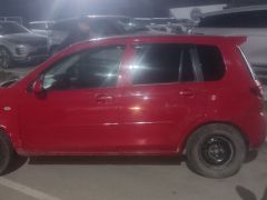 Photo of the vehicle Mazda Demio