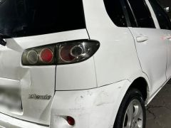 Photo of the vehicle Mazda Demio