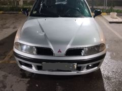 Сүрөт унаа Mitsubishi Carisma