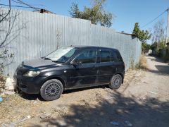 Photo of the vehicle Mazda Demio