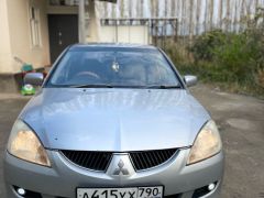 Фото авто Mitsubishi Lancer