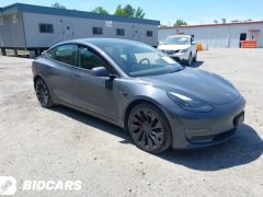 Сүрөт унаа Tesla Model 3