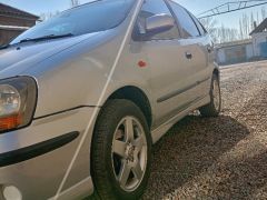 Фото авто Nissan Almera Tino