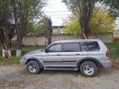 Сүрөт унаа Mitsubishi Montero Sport