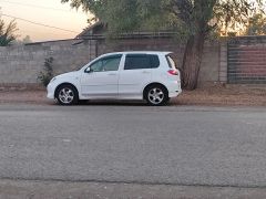 Photo of the vehicle Mazda Demio