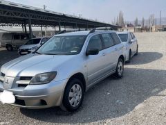 Сүрөт унаа Mitsubishi Outlander