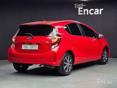 Фото авто Toyota Prius c