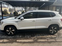 Фото авто Volkswagen Tharu