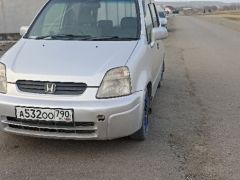 Фото авто Honda Capa