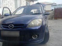 Photo of the vehicle Mazda Demio