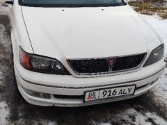 Сүрөт унаа Toyota Vitz