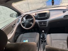 Фото авто Nissan Almera Tino