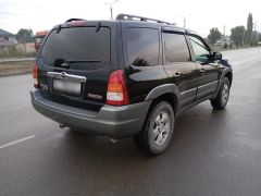 Photo of the vehicle Mazda Tribute