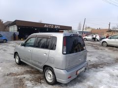 Photo of the vehicle Nissan Cube