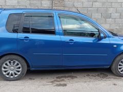 Сүрөт унаа Mazda Demio