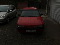 Photo of the vehicle Mazda 323