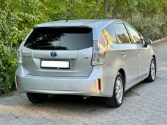 Фото авто Toyota Prius v (+)