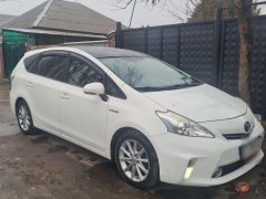 Photo of the vehicle Toyota Prius v (+)