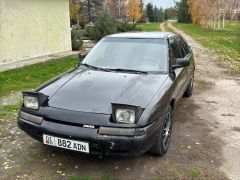 Сүрөт унаа Mazda 323