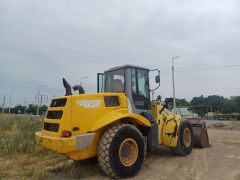 Photo of the vehicle New Holland W - Series