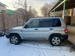 Photo of the vehicle Mitsubishi Pajero iO