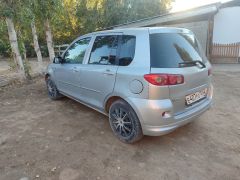 Photo of the vehicle Mazda Demio