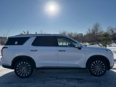 Photo of the vehicle Hyundai Palisade