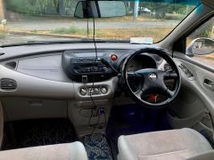 Фото авто Nissan Almera Tino