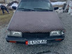 Сүрөт унаа Mazda 323