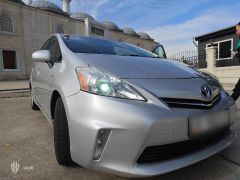 Фото авто Toyota Prius v (+)