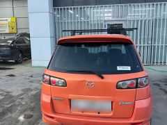 Photo of the vehicle Mazda Demio