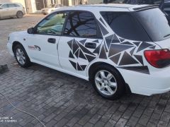 Photo of the vehicle Subaru Impreza