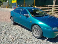 Photo of the vehicle Mazda 323