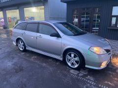 Photo of the vehicle Nissan Primera