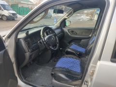 Photo of the vehicle Mazda Tribute