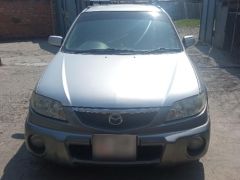 Фото авто Mazda Familia