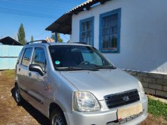 Photo of the vehicle Suzuki Wagon R+