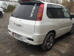 Фото авто Mitsubishi RVR