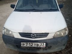 Фото авто Mazda Demio