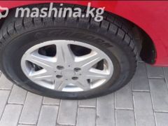 Photo of the vehicle Mazda Demio