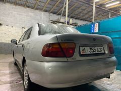 Сүрөт унаа Mitsubishi Carisma