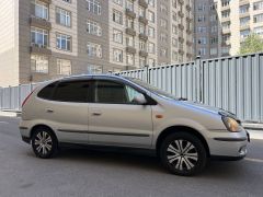 Photo of the vehicle Nissan Almera Tino