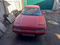 Photo of the vehicle Mazda 323