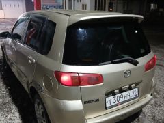 Photo of the vehicle Mazda Demio