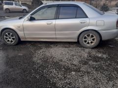 Фото авто Mazda 323