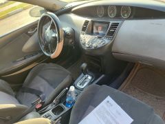 Фото авто Nissan Primera