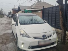 Photo of the vehicle Toyota Prius v (+)