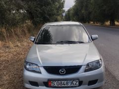 Сүрөт унаа Mazda 323