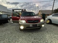 Photo of the vehicle Mazda Tribute